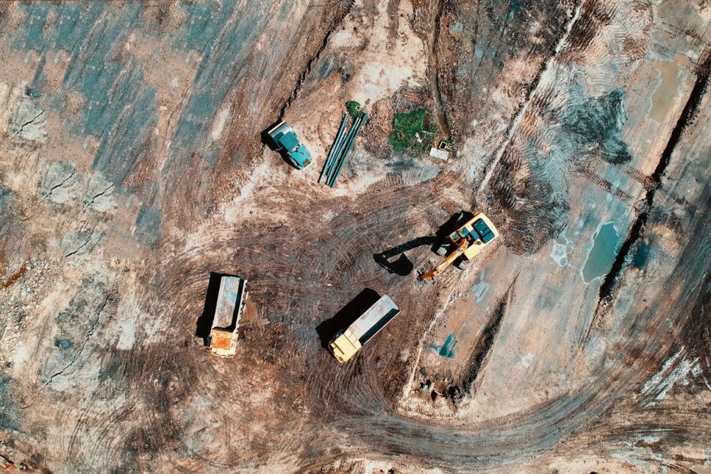 bird-s-eye-view-photo-of-heavy-equipment-on-construction-site-1188554 Birds Eye View Photo Of Heavy Equipment On Construction Site